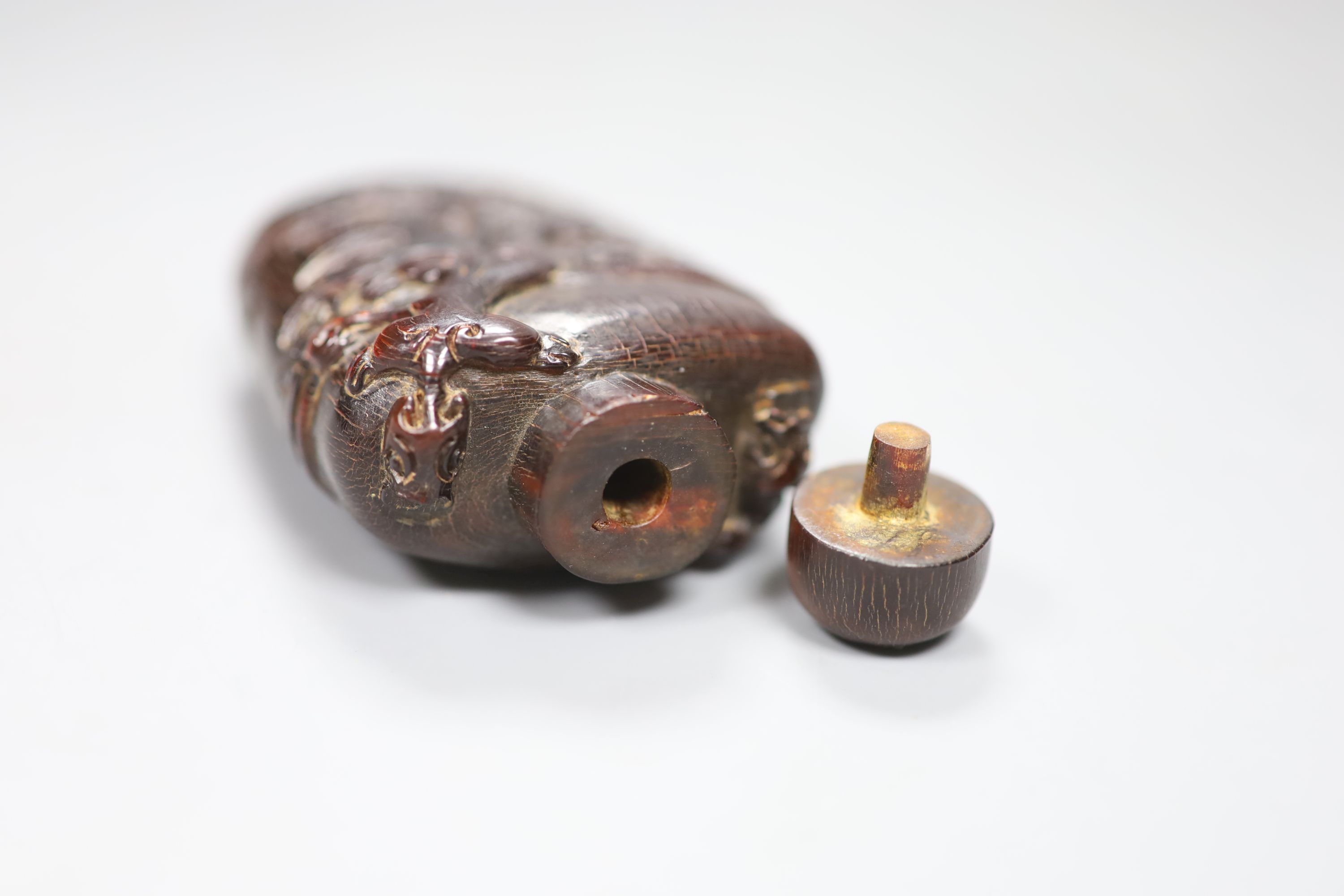 A Chinese archaistic horn snuff bottle and stopper, height 9.5cm